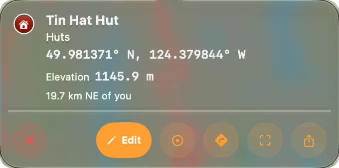 The card for Tin Hat Hut on Mac: the name, the line Huts, the coordinate, Elevation 1145.9 m, the distance and bearing from you, and the button row with Edit as the pill